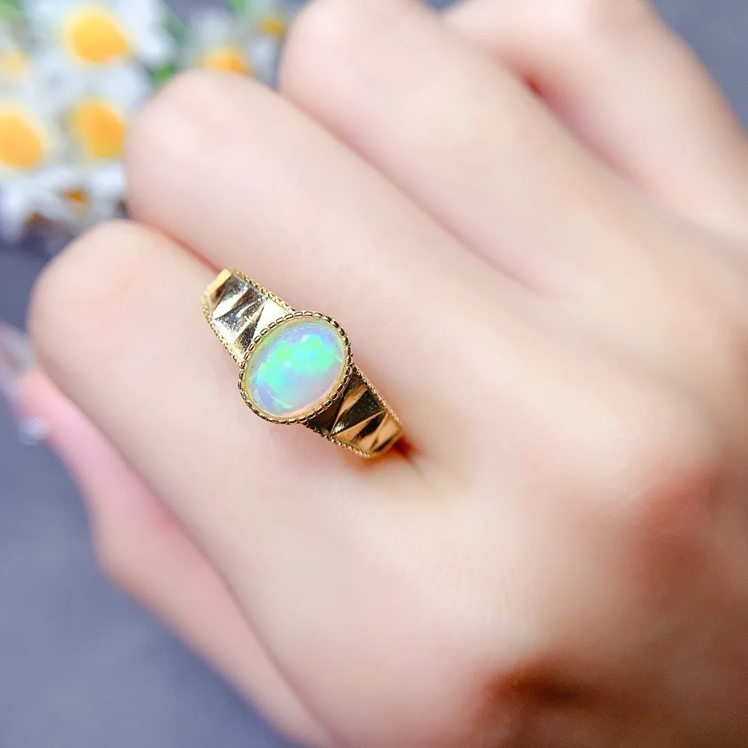 

A Symphony of Luxur This Exquisite S925 Silver Designer Ring Features A Mesmerizing Natural Opal for A Elegant Gift