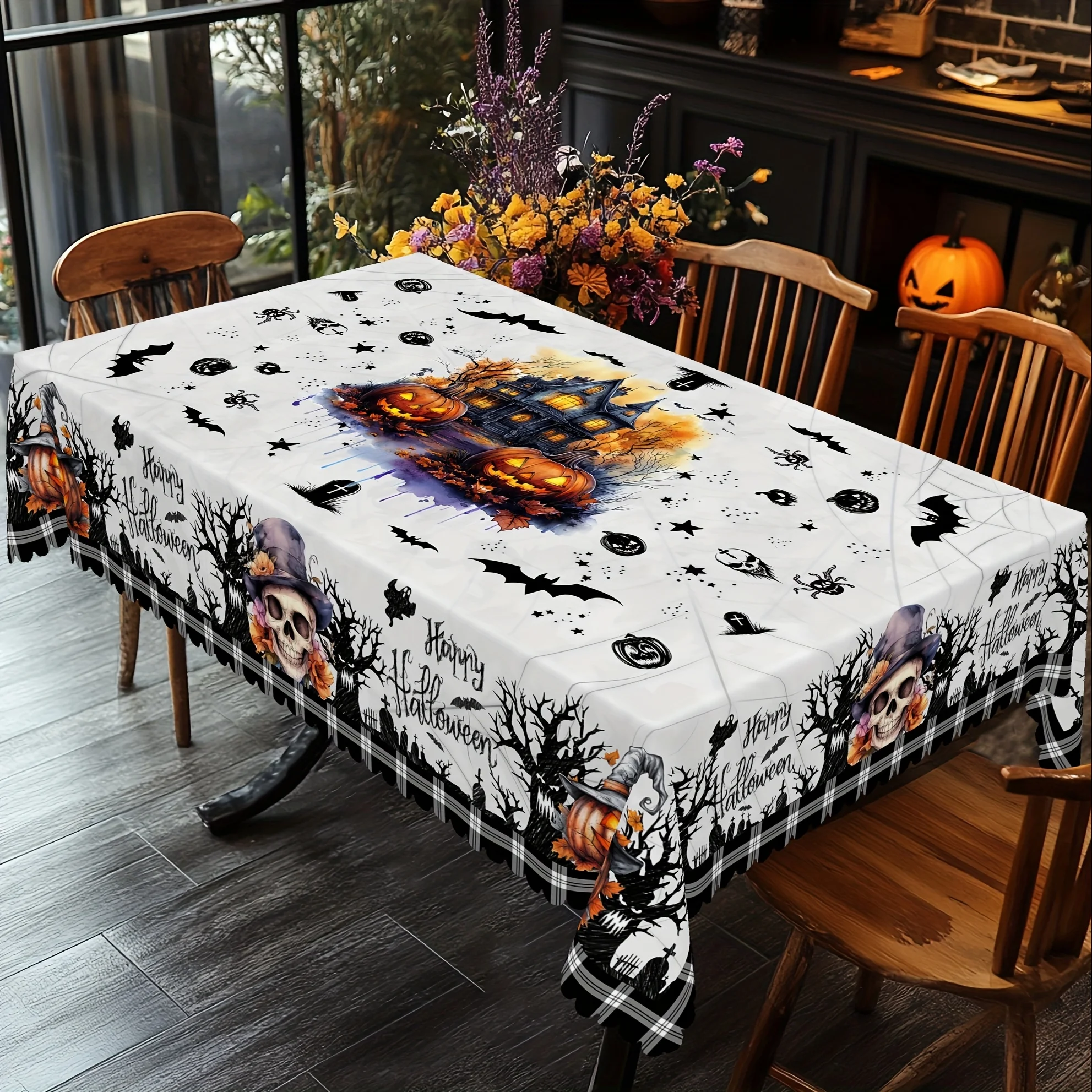 One circular tablecloth with a Halloween-themed horror castle pattern and checkered design