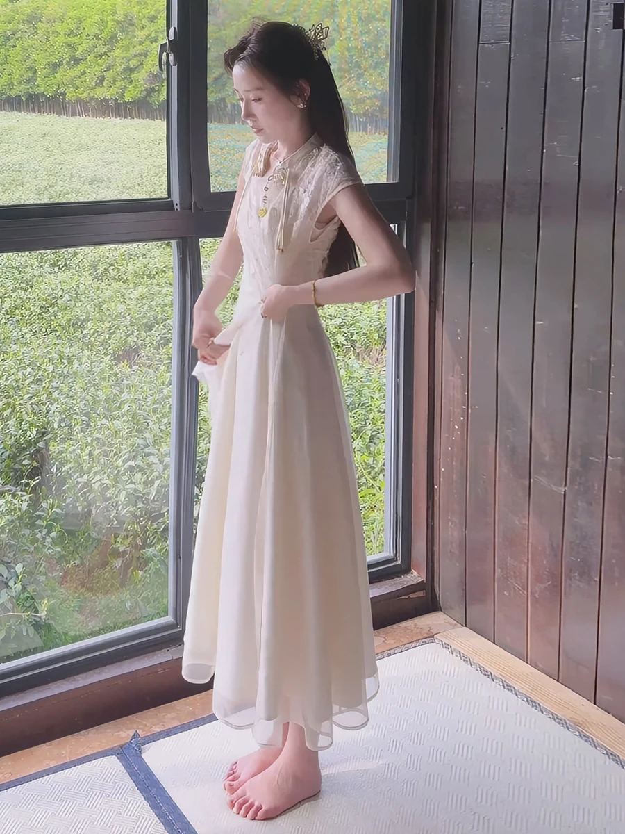 

Новый китайский комплект из двух предметов для женщин, лето 2026: нежный национальный трендовый короткий топ и платье на бретельках.