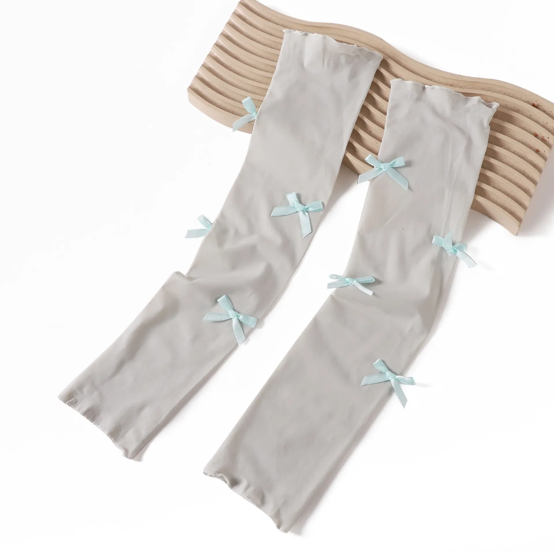 

2 шт., рукава из ледяного шелка с бантом, спортивные рукава, защита от солнца и ультрафиолета, женская одежда для бега, рыбалки, езды на велосипеде, лыжная одежда, уличная защита для рук