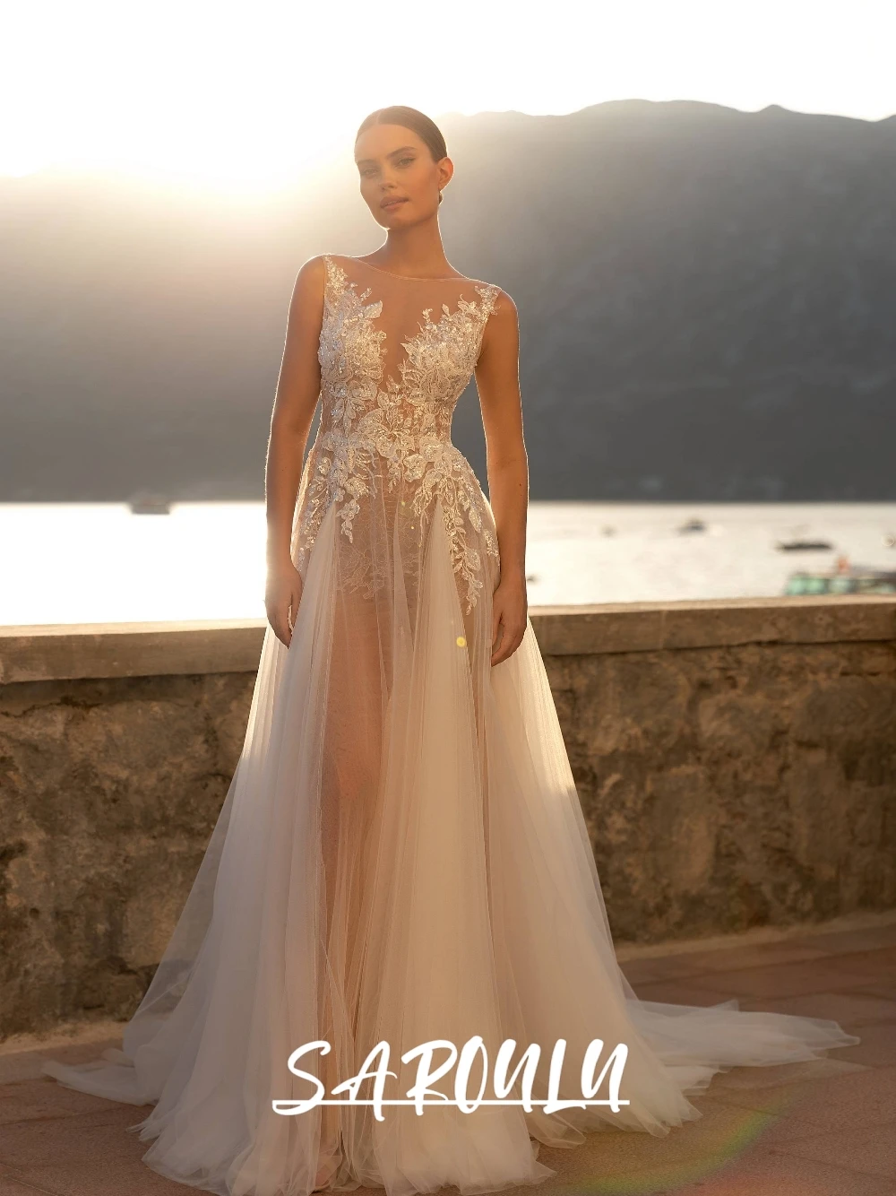 

Elegant Sheer Tulle Wedding Dress With Intricate Lace Appliques Sparkling Sequins Sexy Open Back A Line Beach Bridal Gown