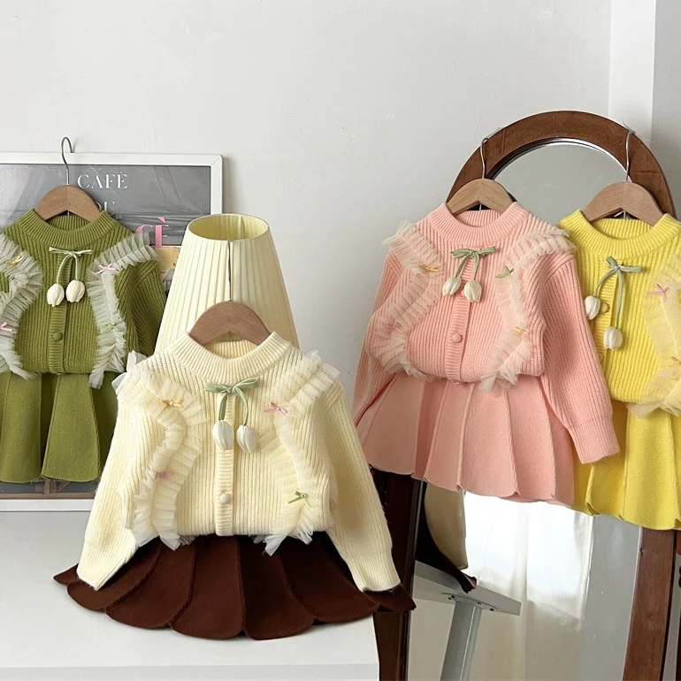 Meninas terno 2025 primavera e outono novas roupas infantis meninas bebê doce laço arco malha camisola saia plissada dois conjuntos