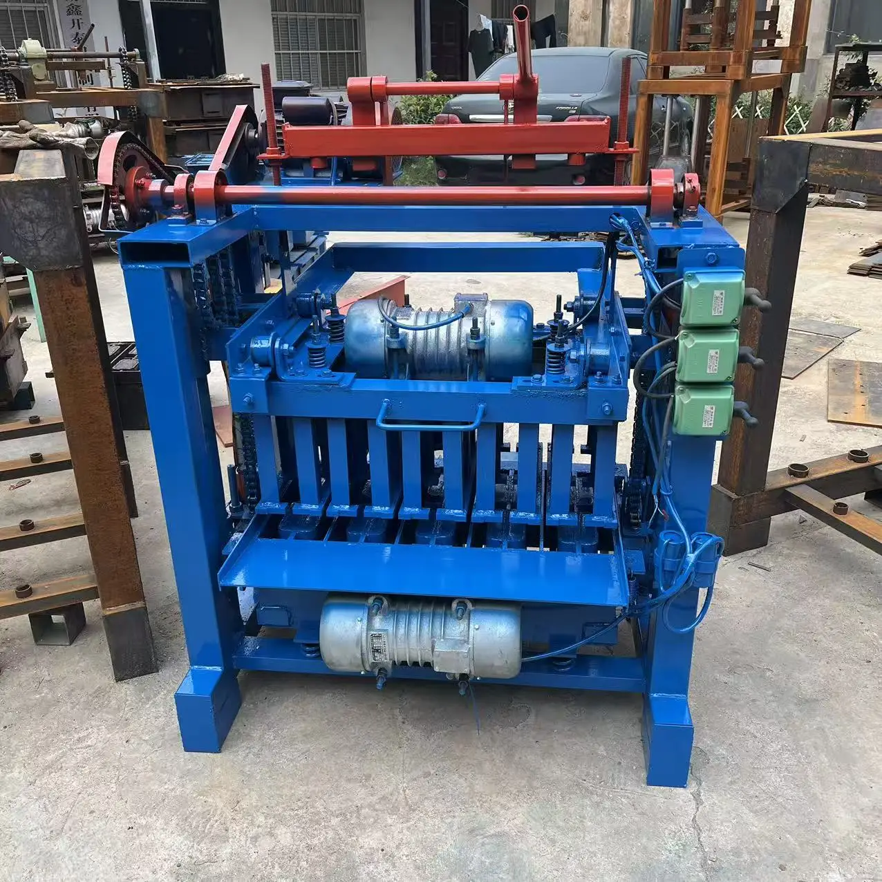 

Low cost concrete cement block brick making machine, with free mold hollow concrete block brick making machine