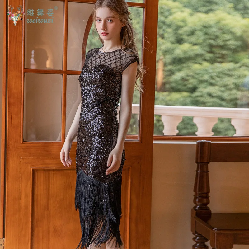 Abito femminile sexy con frange di paillettes O-Collo senza maniche Vedi attraverso la maglia aderente Abito con nappe stanche Abito da banchetto per feste con glitter