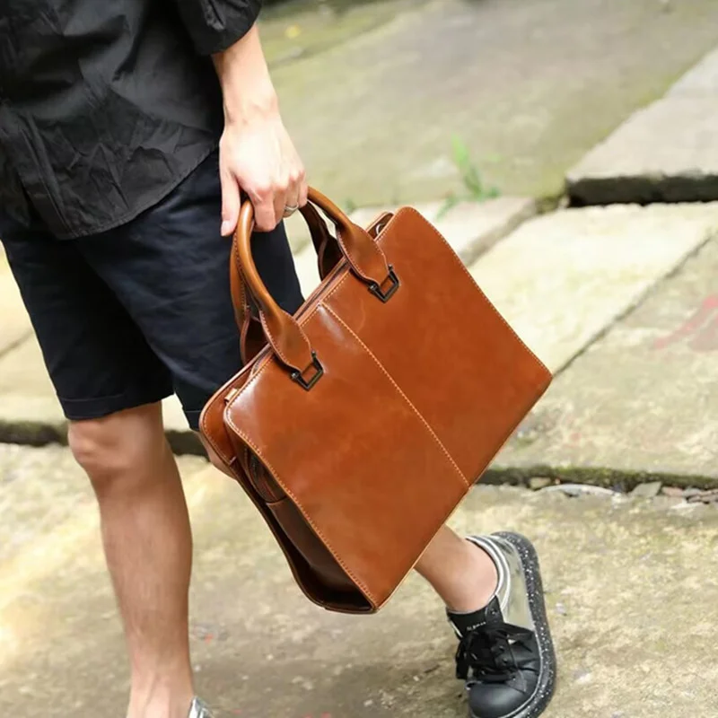 Sac à main rétro en cuir souple pour hommes, sac à bombes de luxe, sac fourre-tout de grande capacité, sac messager lancé par un homme, sac pour ordinateur portable d'affaires