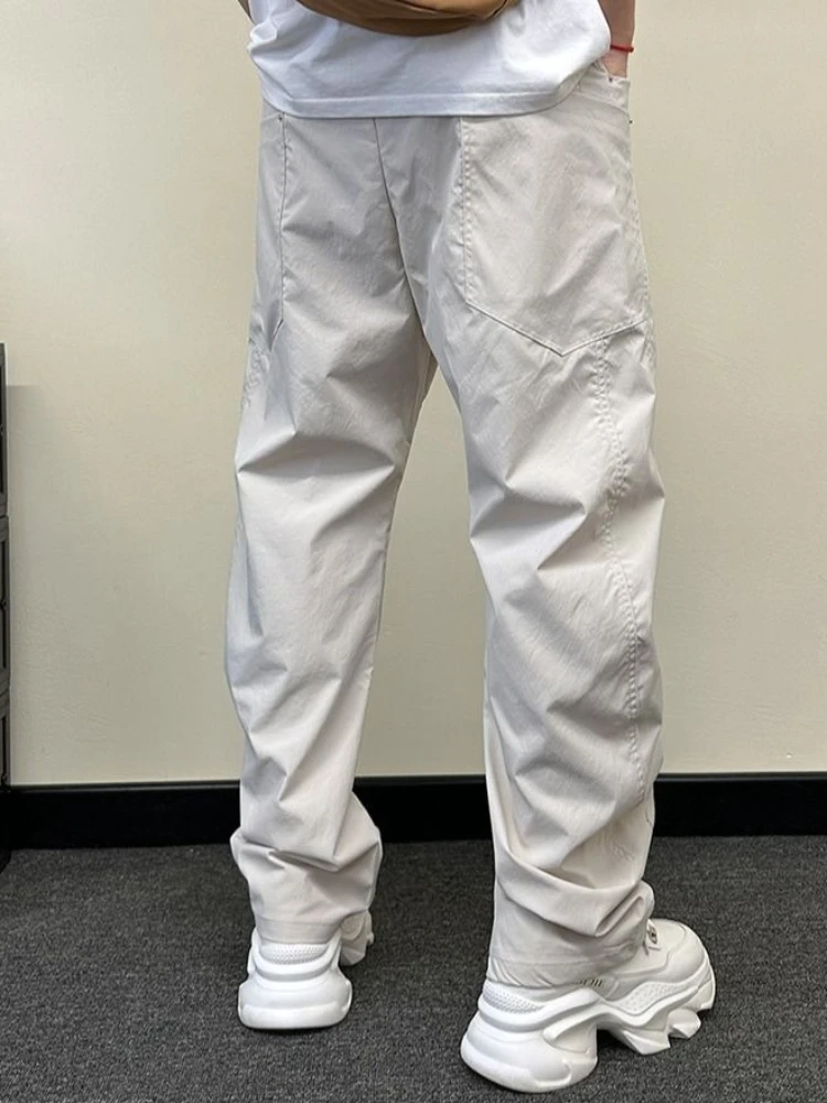 Calças casuais baggy homem solto novo na tendência estética roupas clássicas harajuku moda venda 2025 tamanho grande xxxl calças para homem