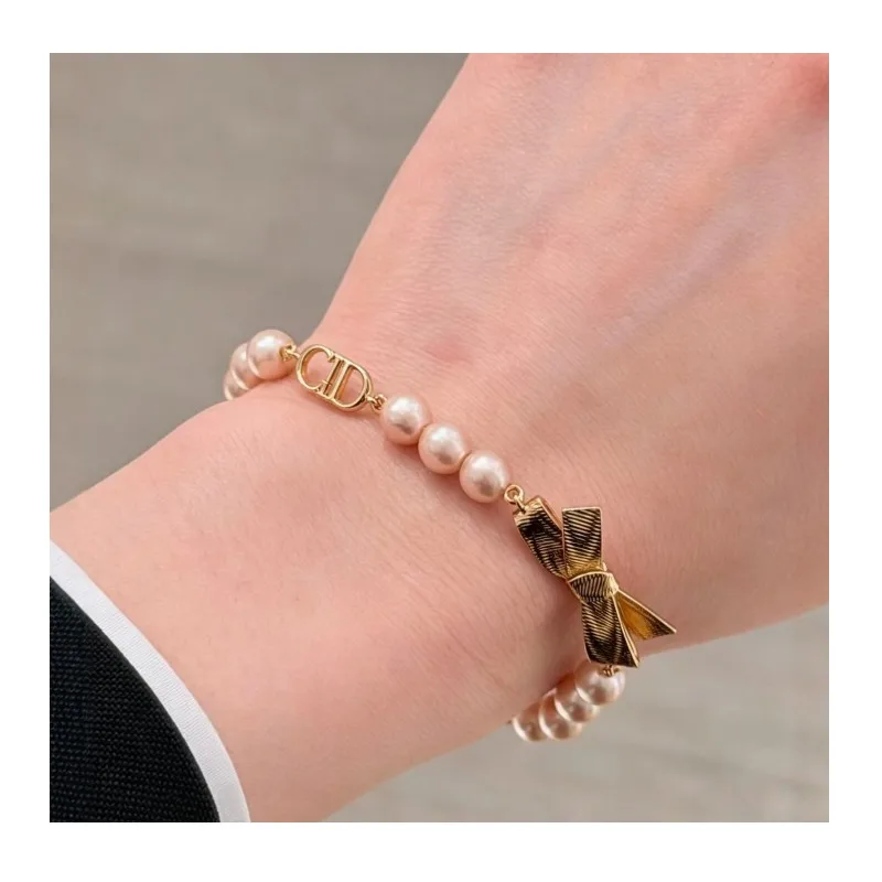

Cabinet Gold Bow & Letter Pink Pearl String Chain Bracelet Iridescent Pink Bead Butterfly Control Jewelry