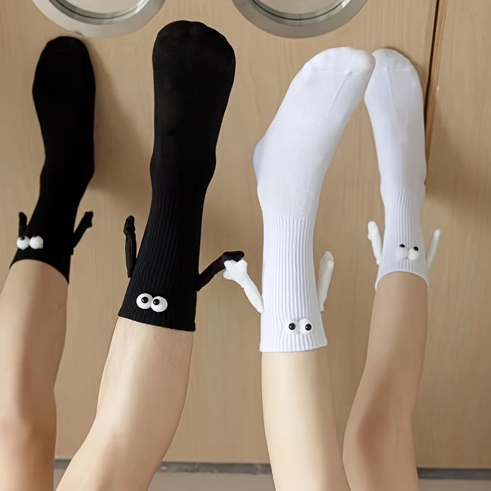 A pair of mid length socks, trendy for both men and women, magnetic attraction, super personality, 3D dolls, black and white ero