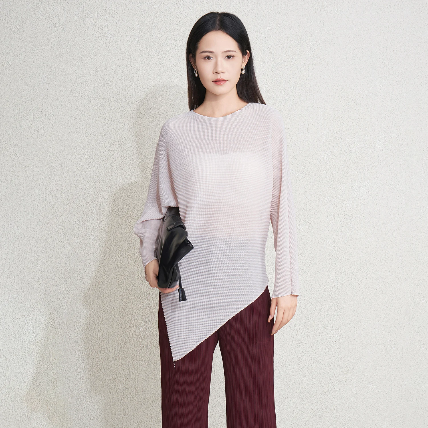 2025 Miyake blusa plisada moda suelta dobladillo asimétrico tejido Casual Top mujer Jersey suéter