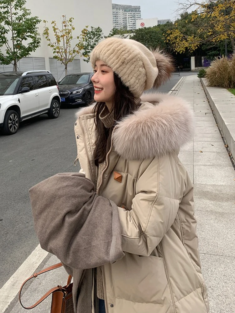 سترة قطن عادية لخريف وشتاء 2025 النسخة الكورية كبيرة بياقة من الفرو مع قلنسوة سترات دافئة فضفاضة فوق الركبة معطف قطني #5