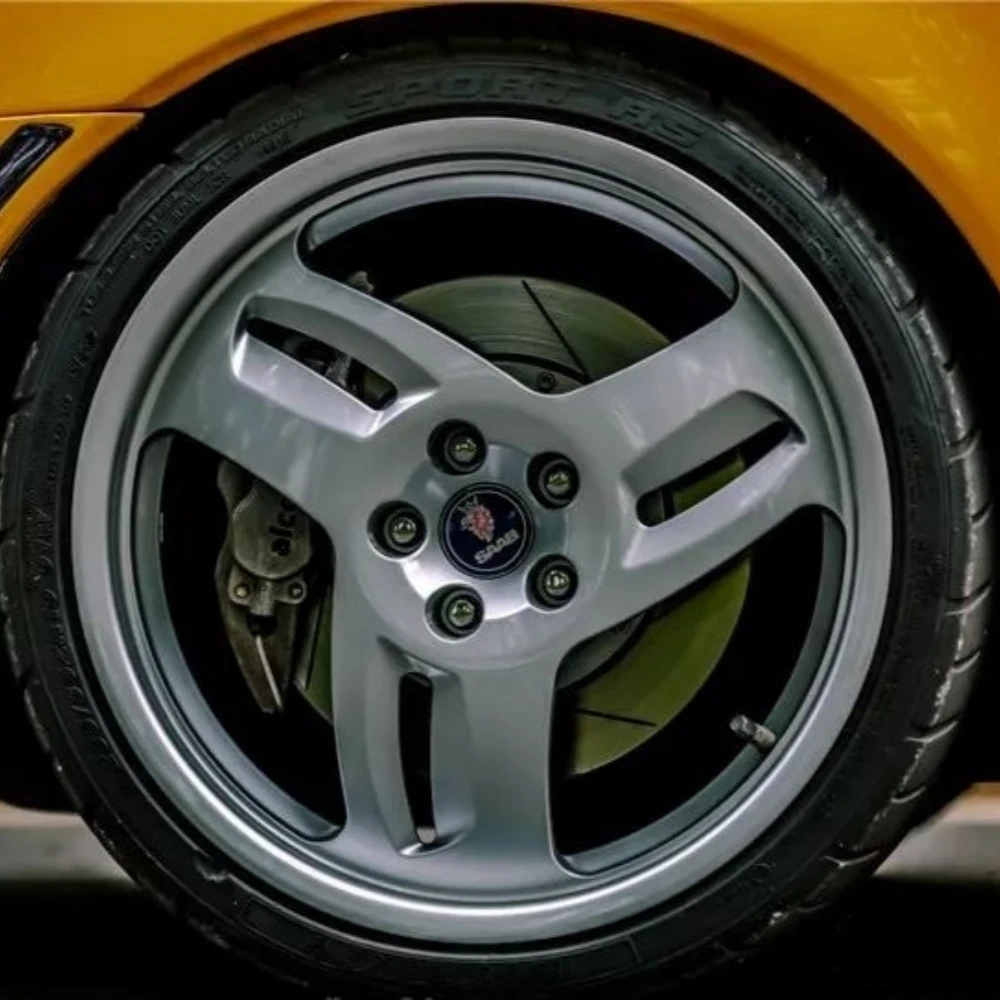 4 قطعة 56 مللي متر 60 مللي متر شعار سيارة شعار ملصقات السيارات اكسسوارات ل ساب 93 95 سيارة عجلة مركز قبعات حافة عجلات غطاء محور شارة استبدال