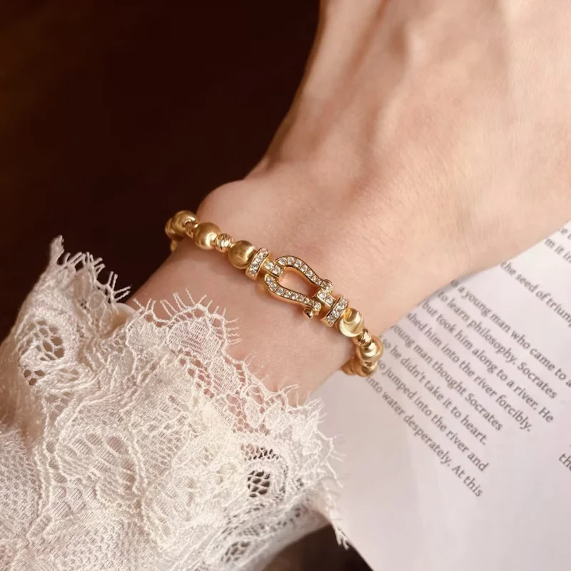 

Copper Electroplated Gold European and American Heavy Craft Pure Silver Cat Eye Horseshoe Clasp Bracelet Accessory Versatile Lig