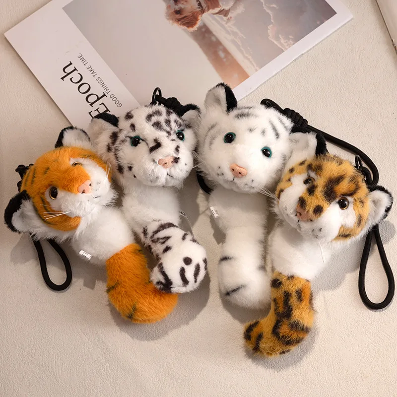 

Плюшевый брелок-подвеска 15 см: реалистичные животные (слон, тигр, енот, леопард) с застежкой-пряжкой, легко снимается. Идеальный подарок для мальчиков и девочек.