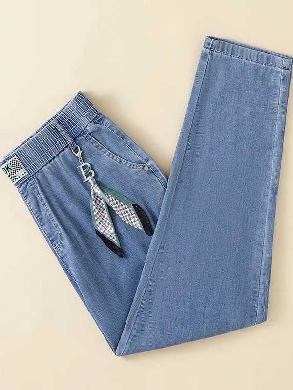 กางเกงยีนส์เอวบางยืดหยุ่นสำหรับฤดูร้อน รุ่นปี 2025 ทรงฮาร์แลน ความยาวเก้าส่วน สไตล์ลำลอง ไซส์ใหญ่ ทรงหลวม ผ้าไหมน้ำแข็ง ทรงกางเกงกะหล่ำปลี