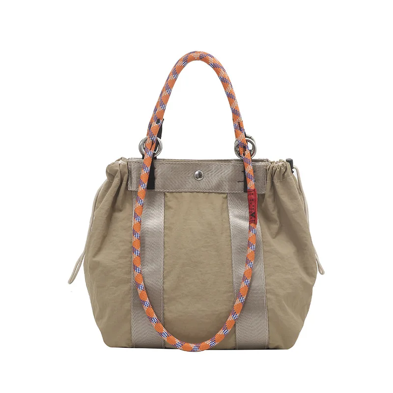 

Women's Minimalist Casual Nylon Tote Bag - Large Capacity, Water-Resistant & Stylish for Commute (Shoulder & Handheld)