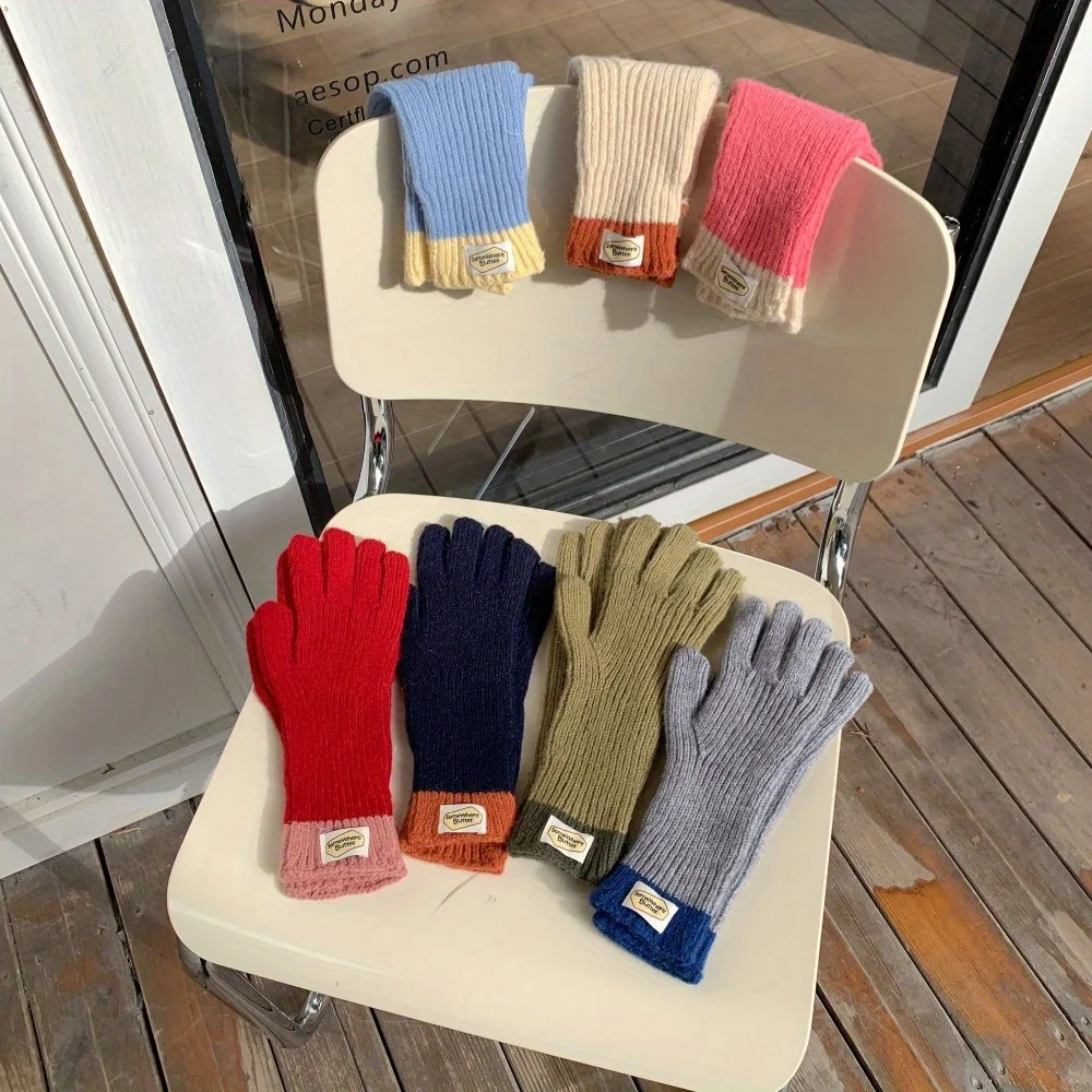 solid-color stretch-length gloves with two fingerless holes and touchscreen technology for college/skiing/morning workouts, etc