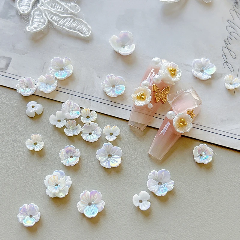 50PCS Colorful Aurora White Flower 3D Nail Charms Sea Shell Shiny Floral Butterfly decorazioni per unghie fai da te Manicure Nail Supply