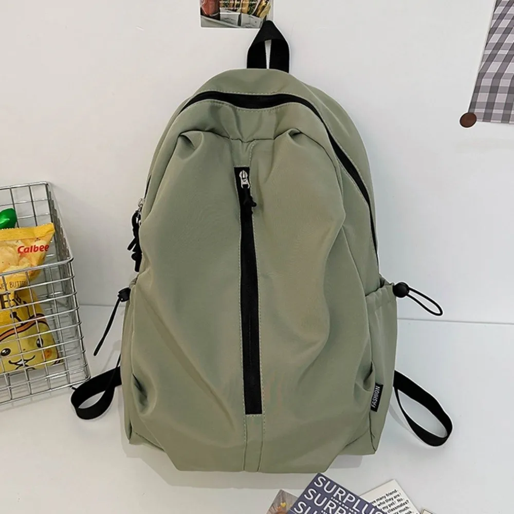 حقيبة ظهر عصرية ذات سعة كبيرة وبسيطة مقاومة للماء بلون سادة حقيبة جامعية بسحاب حقيبة كتب خفيفة الوزن في الهواء الطلق