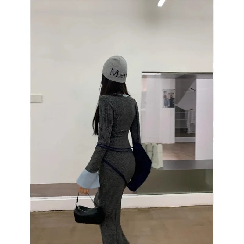 Women's Knee Length Pullover half-zipper detail demonstrating smooth operation and bow accent attachment