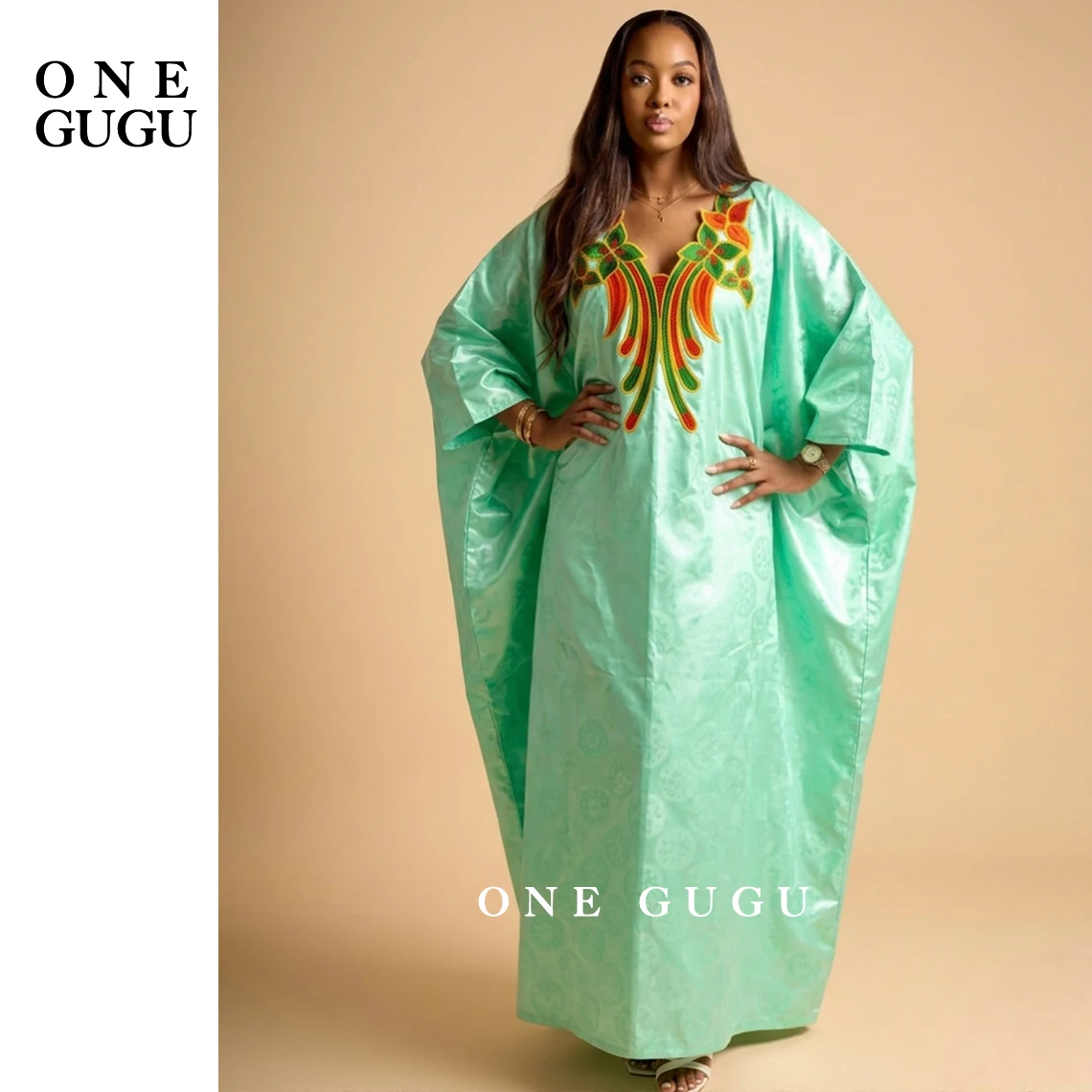 

Мятно-зеленое оригинальное парфюмированное платье-дашики из нигерийского базина высшего качества, традиционное африканское свадебное платье-бубу из базина-риш, длинное платье-роба.