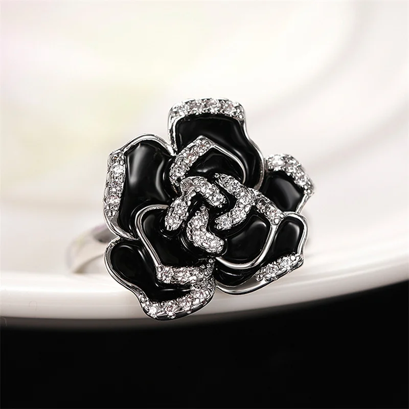 Huitan romantico anello di camelia per le donne smalto nero anelli di fiori estetici accessori per feste di matrimonio da sposa gioielli di lusso