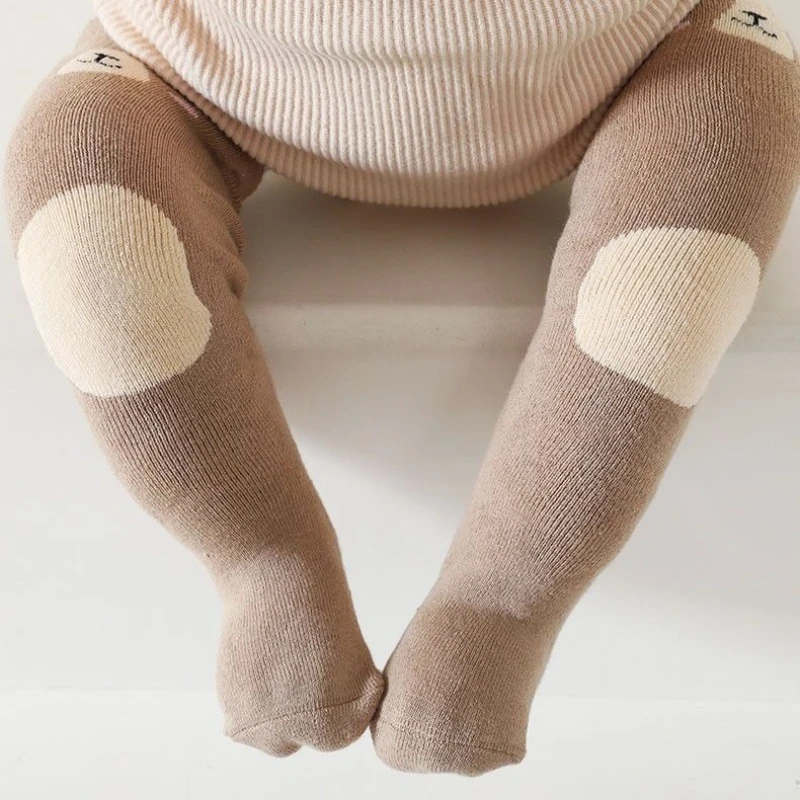 ถุงเท้าเด็กหนาสำหรับฤดูหนาว ถุงเท้าเทอร์รี่แบบยาวถึงเข่า สำหรับเด็กแรกเกิด ให้ความอบอุ่น ทรงหลวม ดีไซน์น่ารัก กันลื่น