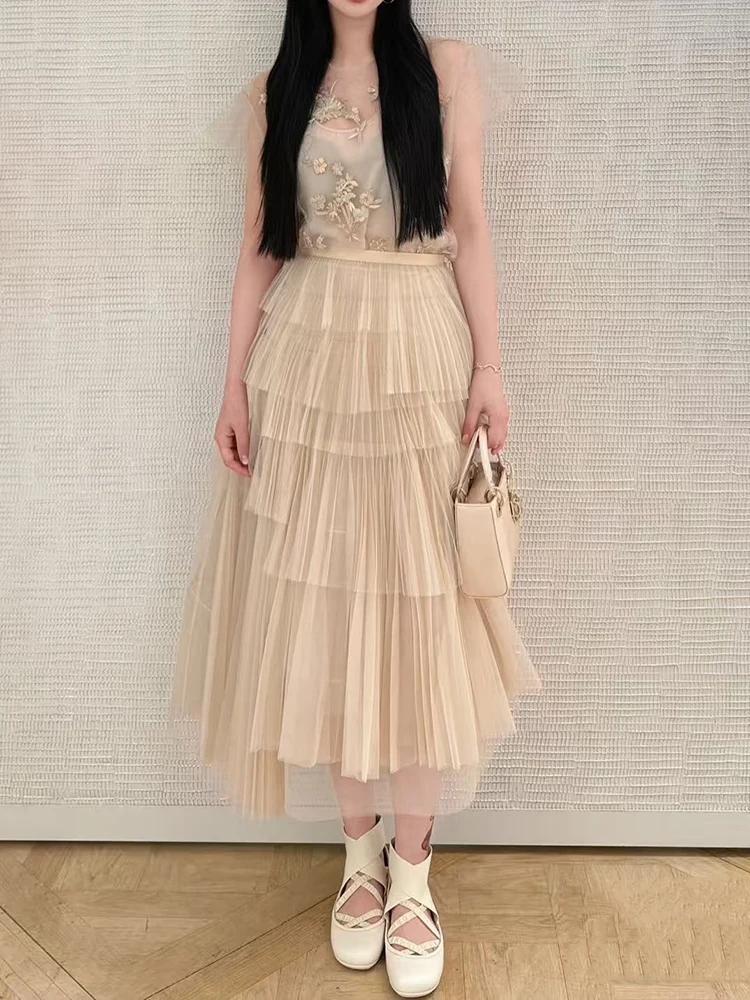 

Spring/Summer 2025 new women's high-waisted thin mesh fabric irregular pleated ruffled mid-length skirt