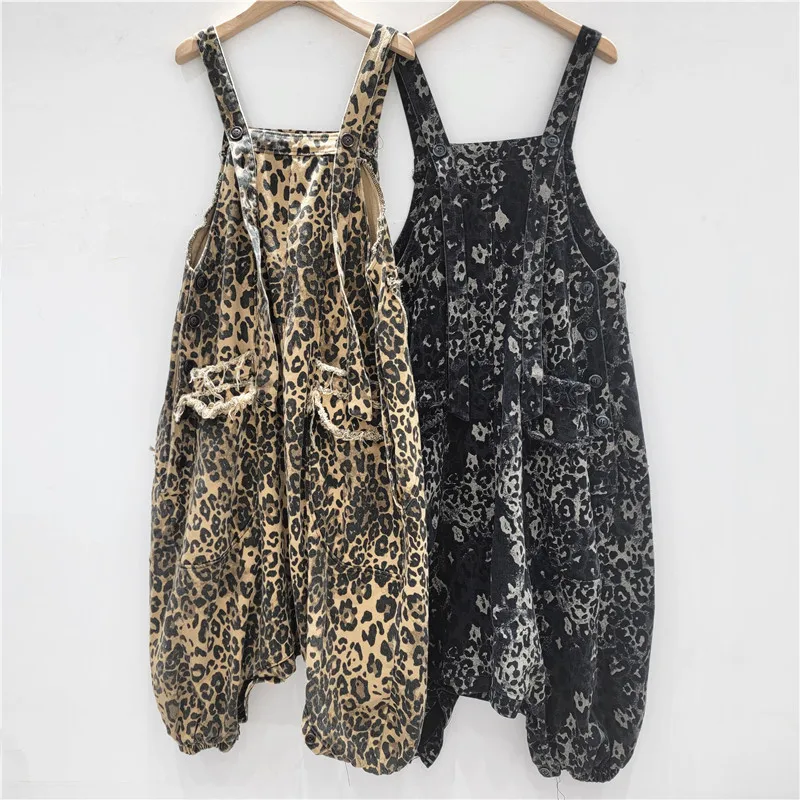 Two-way leopard denim overalls. High-waisted & roomy for a flattering, effortlessly cool vintage vibe.