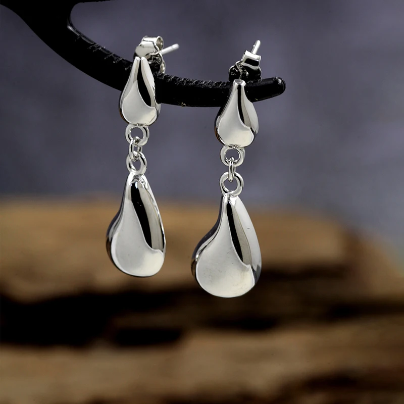 

Korean style niche design minimalist temperament versatile water drop shape texture S925 sterling silver stud earrings