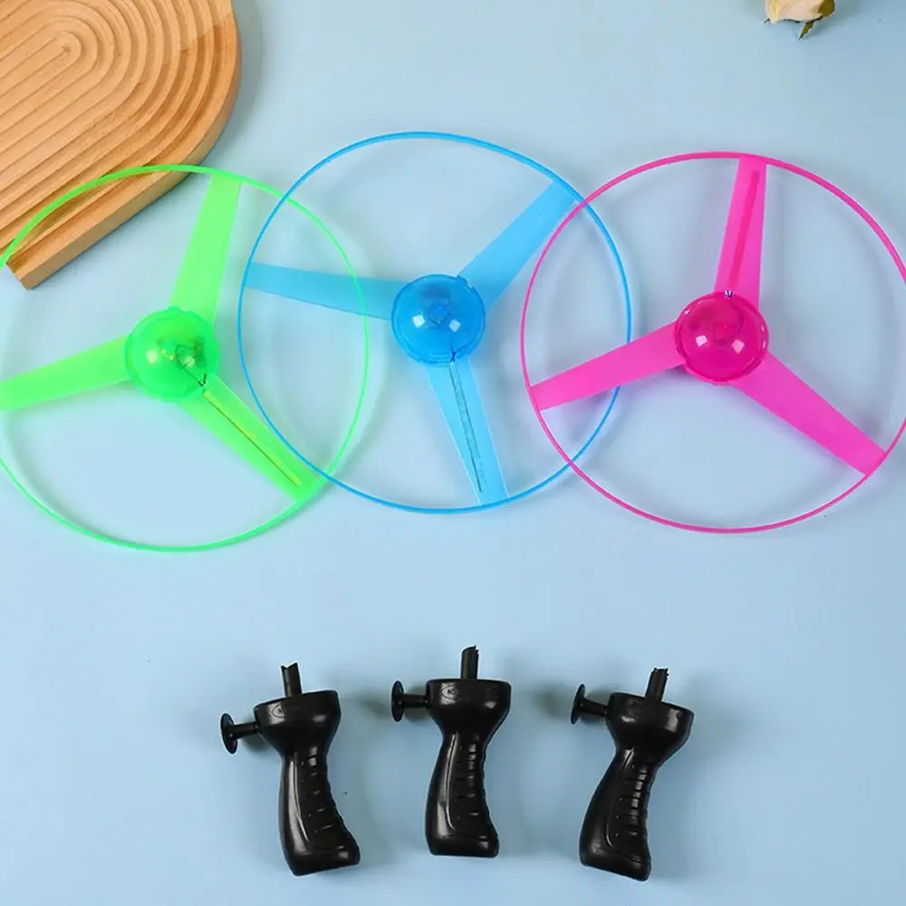 

Funny Plastic Lighting Flying Disc Propeller Toys Hand-push Led Light Flying Pull Wire Toy Spinning Flyer Outdoor Game