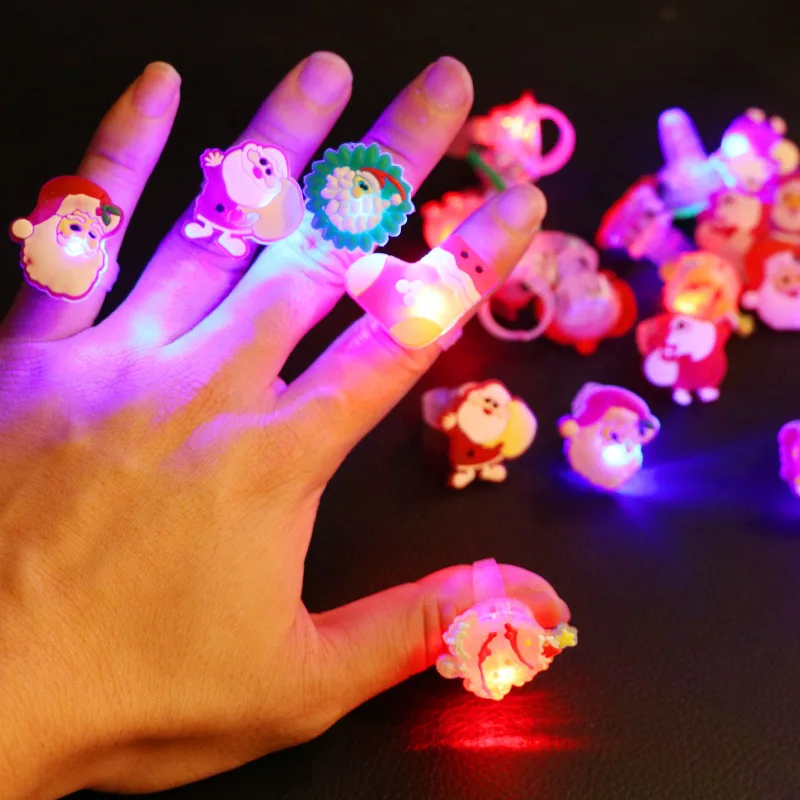 10Pcs/bag Creative Cartoon Cute Father Christmas Finger Ring Toy Christmas LED Glowing Ring Children Toys Kid Holiday Party Gift