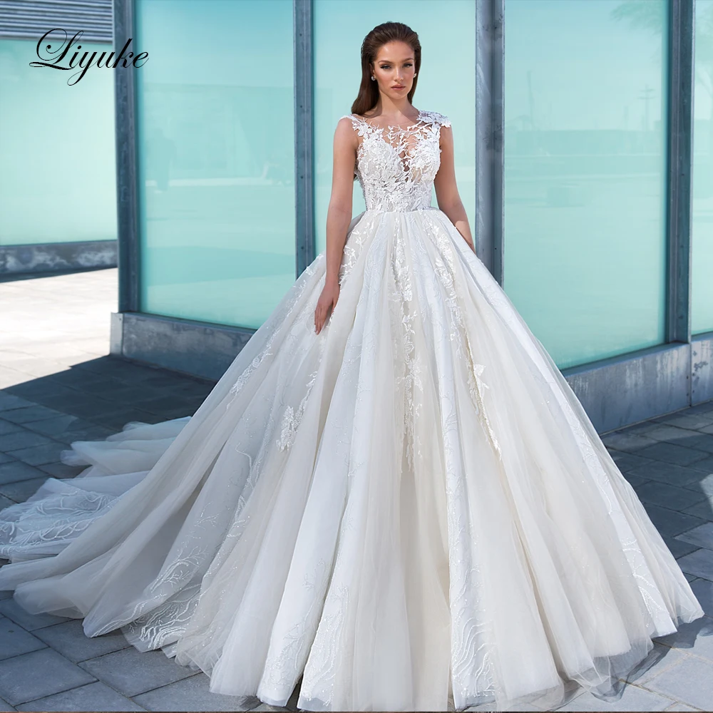 

Liyuke Luxury Of Lace Sparkle Tulle Ball Gown Wedding Dresses Beading Appliques Sleevless Elegant Bridal Shirts