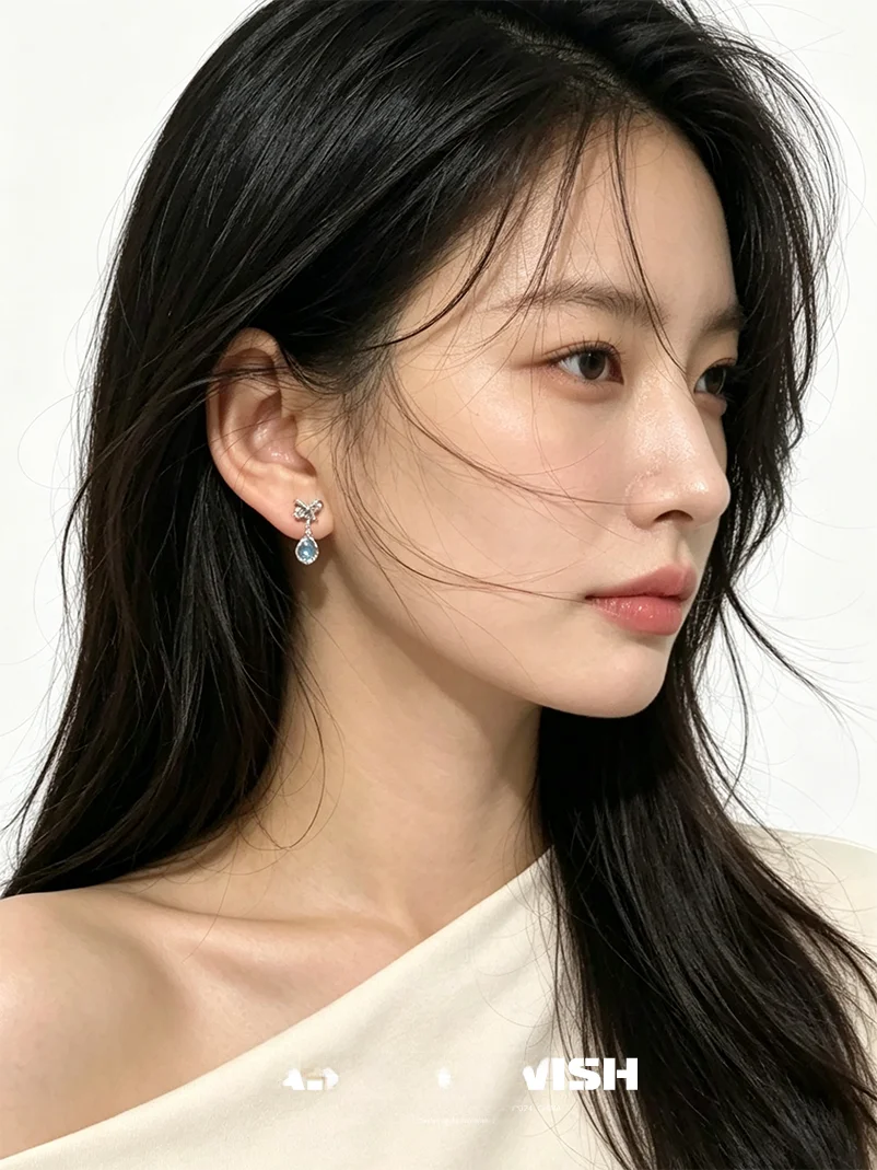 豪華なブルージルコンバタフライノットイヤリング、お好みの感覚を演出するファッショナブルなホワイトカラーの女性用ジュエリー、耳飾り