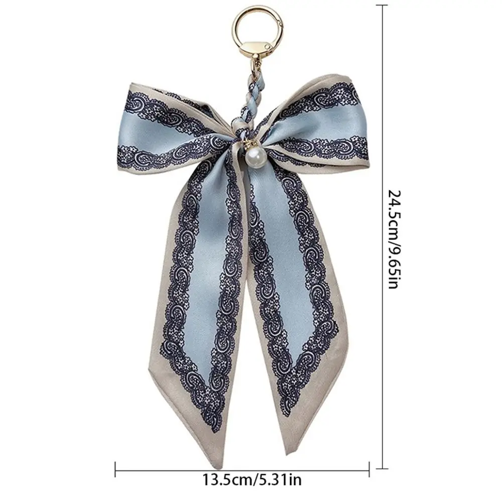 الإبداعية اللؤلؤ وشاح القوس المفاتيح زهرة مطبوعة Bowknot حقيبة قلادة حقيبة الديكور شريط حقيبة الملحقات مفتاح الملحقات