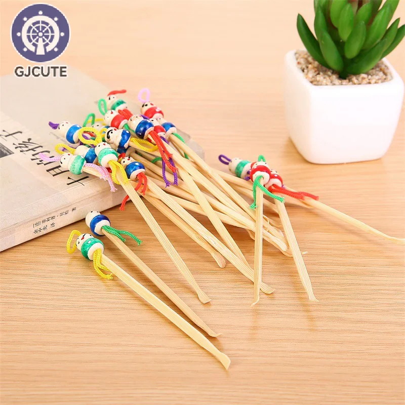 10 Pcs/lot Cartoons Cute Mini Doll Ear Picks Wood Bamboo Earpicks Wax Remover Cleaner Ear Care Tool Random Color