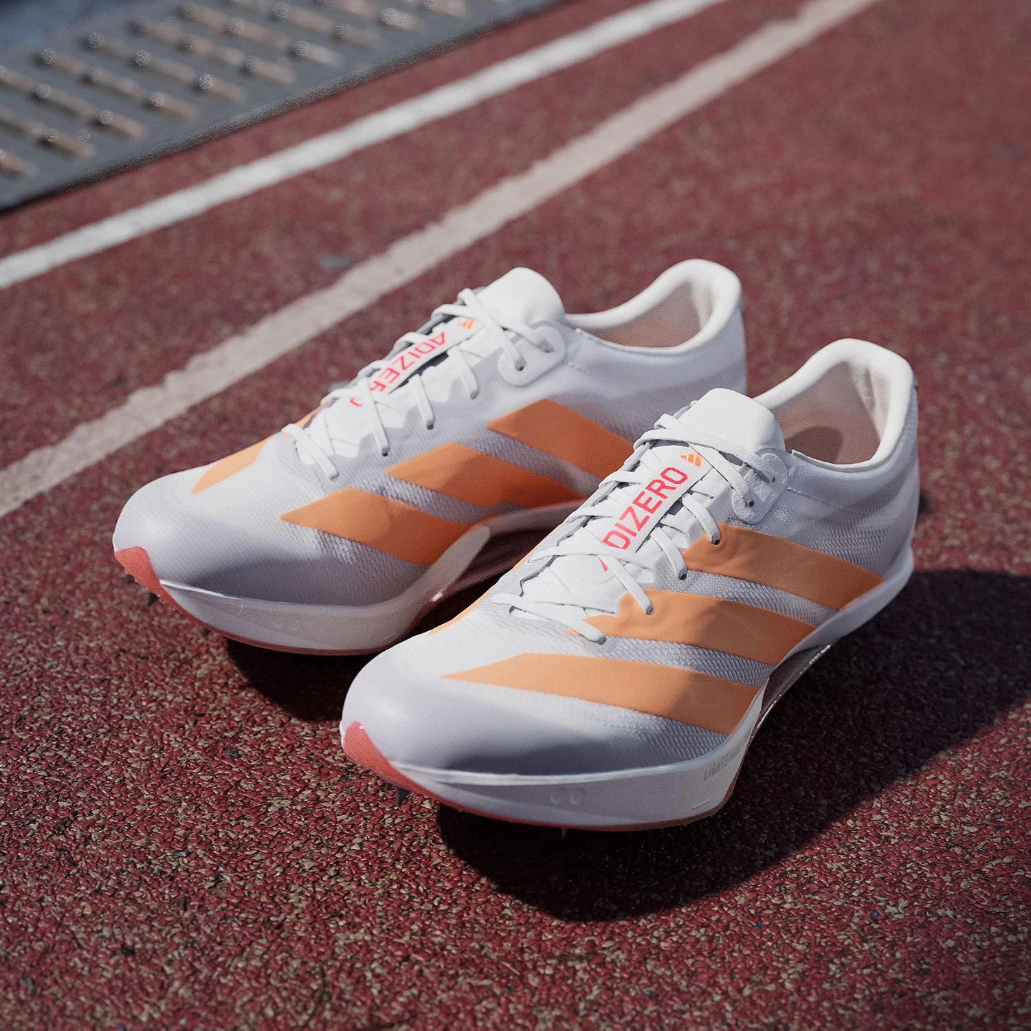 Adidas genuine autumn edition men's and women's shock-absorbing track and field running spikes JQ0795