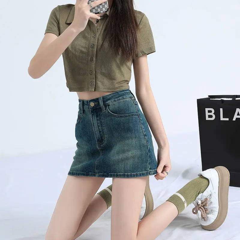 

Ретро-синяя сексуальная джинсовая мини-юбка для миниатюрных женщин, подчеркивающая фигуру и облегающая бедра, на весну 2025 года, с высокой талией, эластичная, А-силуэт.