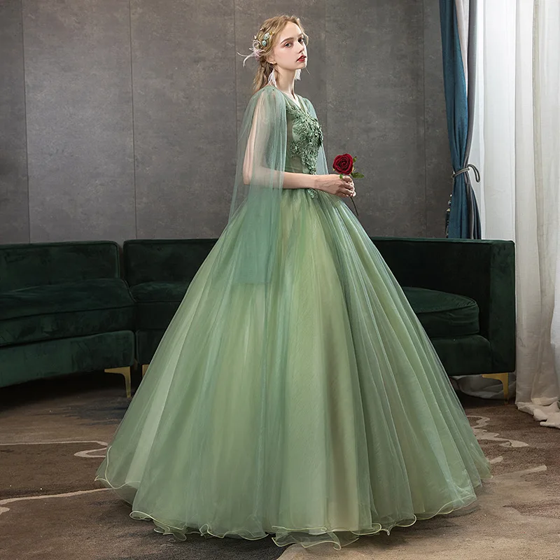 Abiti da ballo con applicazioni in pizzo verde oliva Abiti stile Quinceanera con mantella che borda Perle Abito da festa Abiti da ballo Vestido De 15 16 Anos