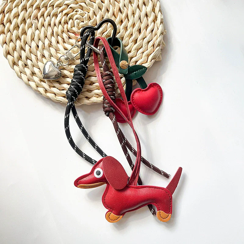 Geflochtener Seilbeutel mit Kirschanhänger, hochwertiger Schlüsselanhänger im Dackel-Stil, geeignet für Handytaschen-Accessoires