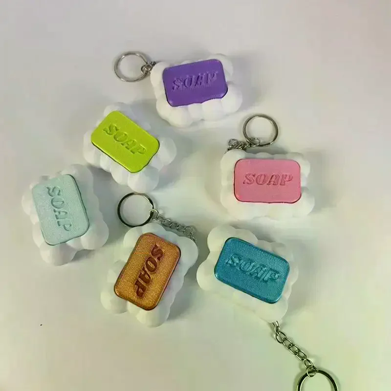 Jouet anti-stress clavier à boutons en forme de savon, imprimé 3D créatif et amusant, clicker de clavier de décompression à pression, pendentif de sac relaxant, porte-clés