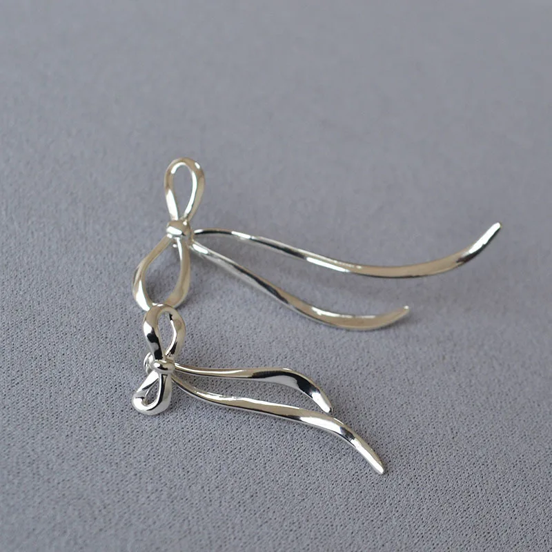 

Minimalist flowing bow detachable earrings women delicate sweet bowknot asymmetry ear accessory for gift
