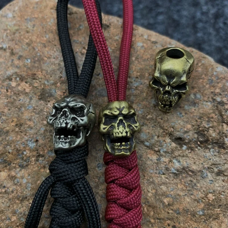 Punk Brass Skull Knife Beads Umberalla Rope Bead White Copper Retro Skull Face Paracord Bead portachiavi per auto ciondolo appeso regali