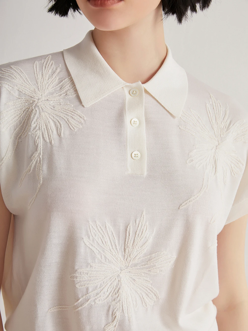 Exquisitely trimmed merino wool silk short sleeve blouse