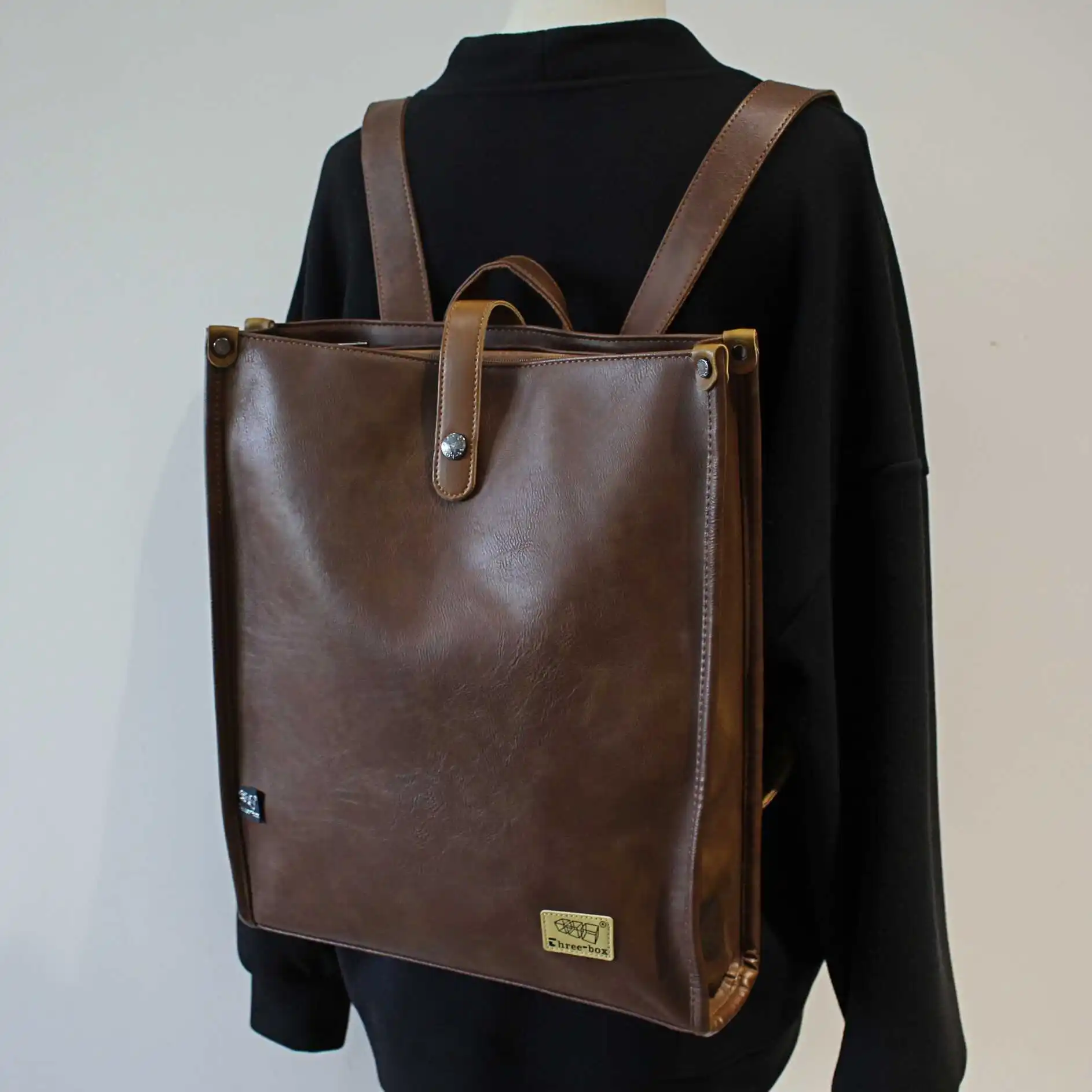 

ThreeBox Large Capacity PU Leather Backpack Fashionable Korean Style Commuter Travel Laptop Bag Unisex Student Bookbag