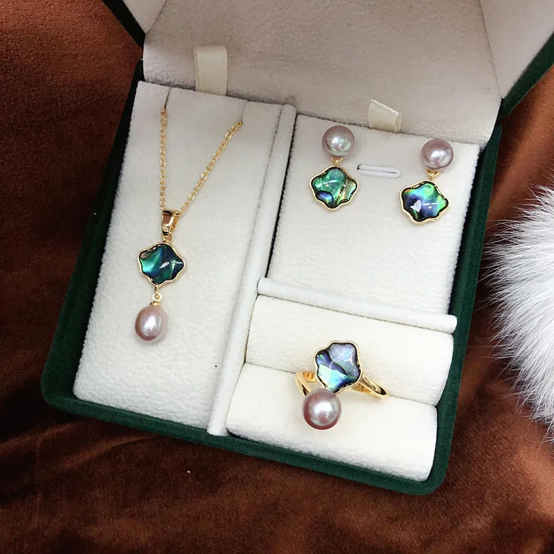 

2024Новые женские серьги с пресноводным жемчугом, элегантные и универсальные, высококачественный комплект подвесок с открытым кольцом с микроинкрустацией, оптовая продажа