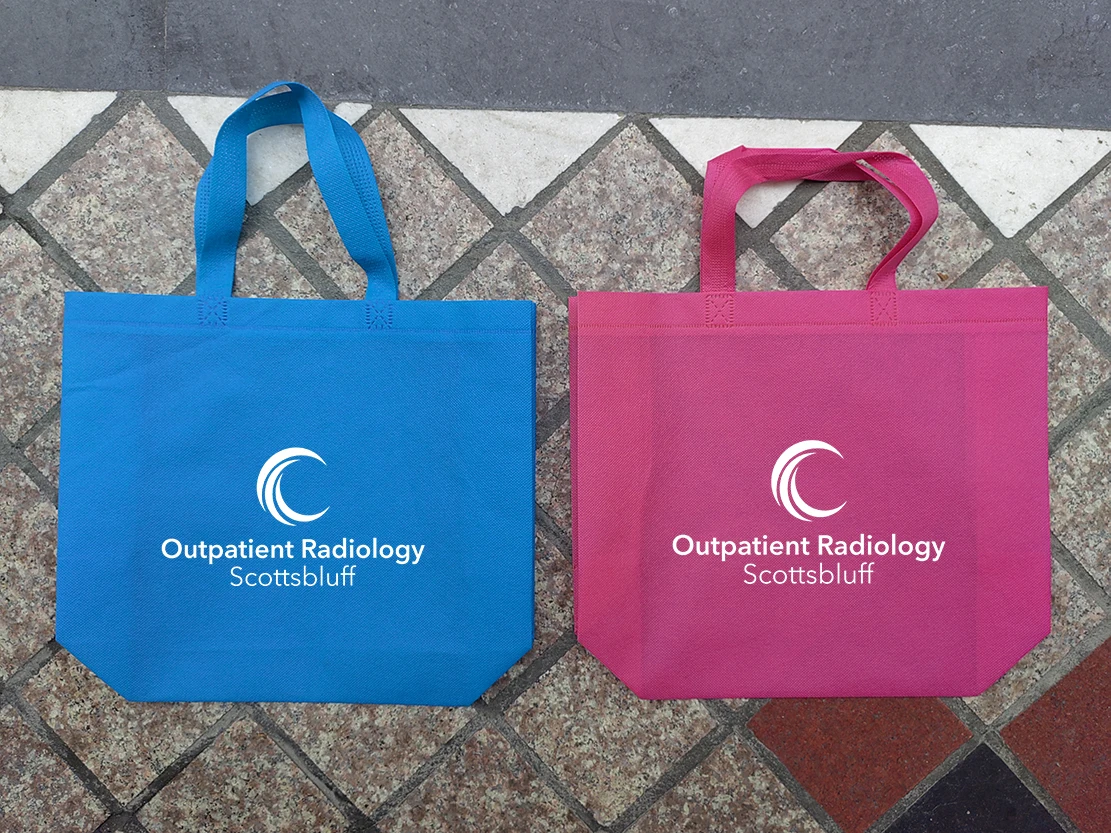 25*35cm  250 pink  bag and 250 blue non woven bags with two sides logo print