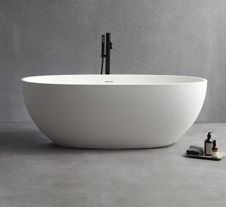

Solid Surface Freestanding Bathtub for Adults White Acrylic with Included Faucet and Drainer Oval Pattern-for Hotels