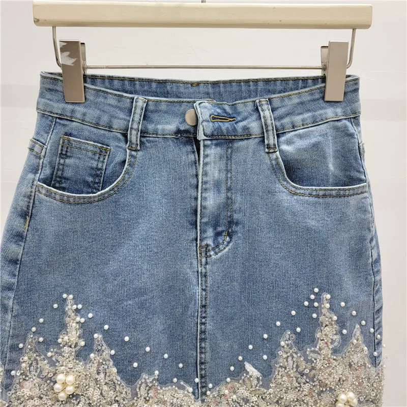 2024 Sommer neue Schwerindustrie Perlen Scheiden rock Frauen Mode Blume bestickt Stretch abnehmen hohe Taille Jeans rock