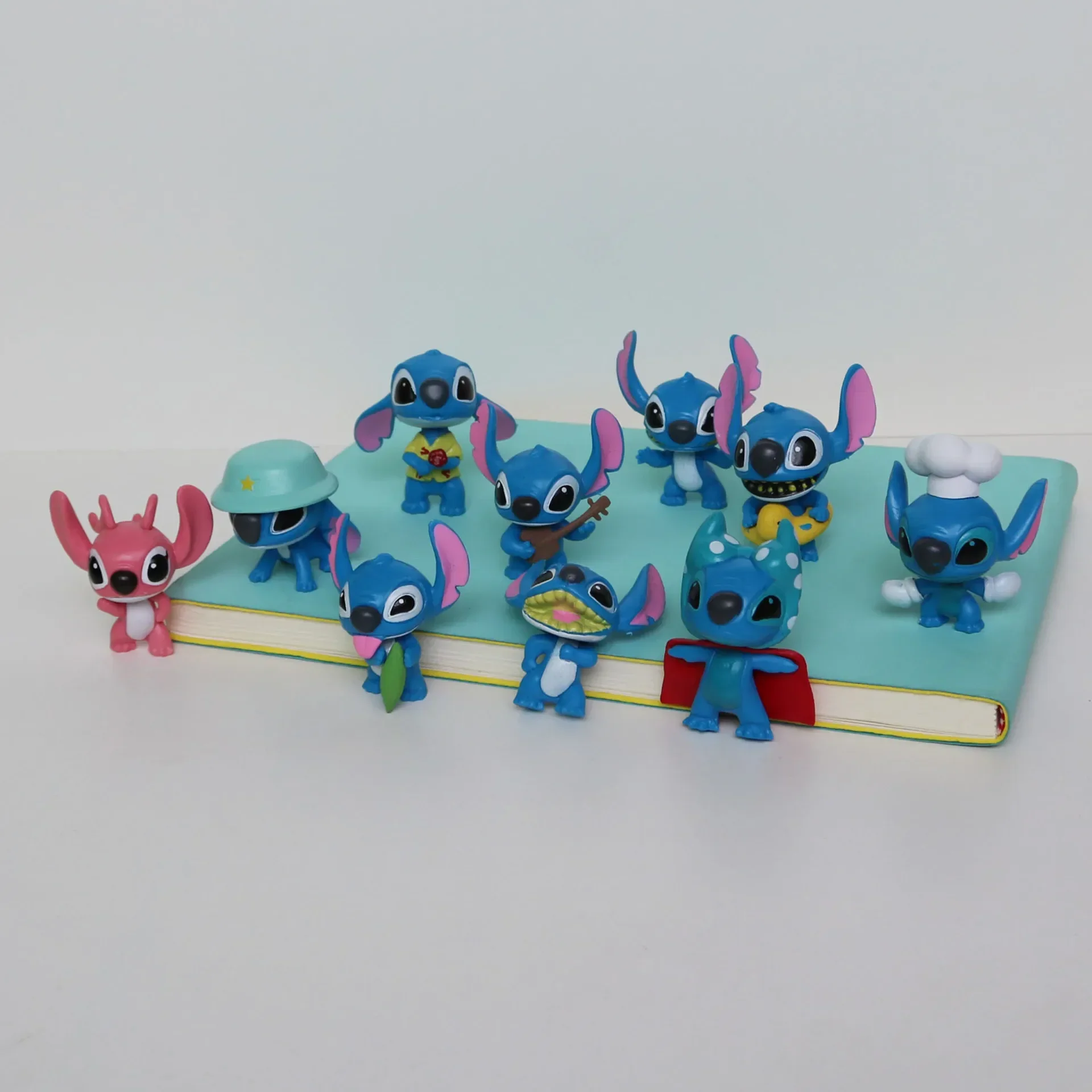 @ 10 Uds. De dibujos animados de Anime Lilo & Stitch Angel, modelo de figura de acción, colección de adornos de escritorio, decoración de pastel de cumpleaños, juguetes para niños