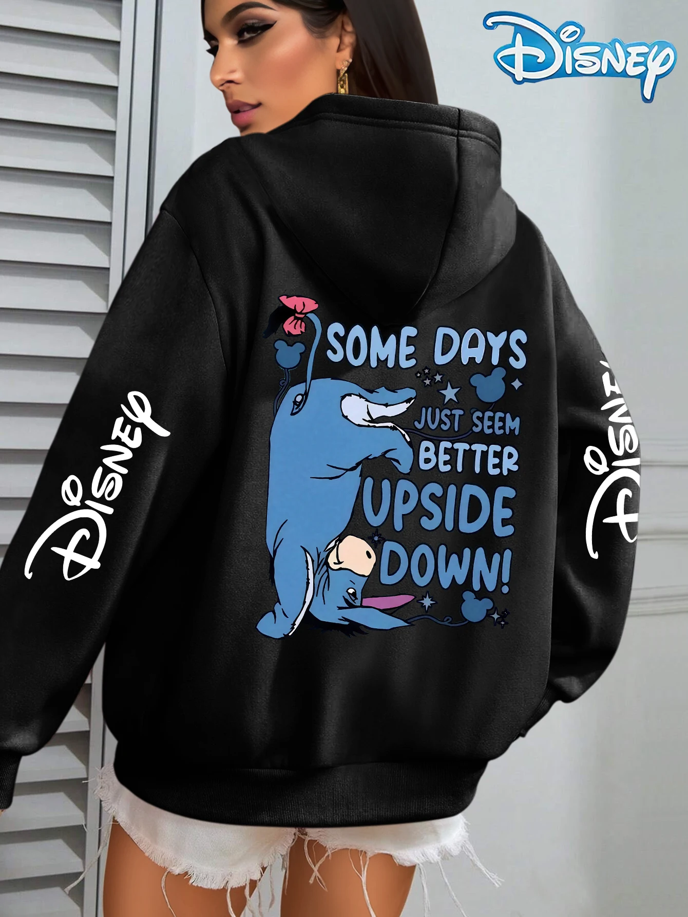 Felpa con cappuccio unisex in pile di cotone Disney Upside Down Donkey bianca con fiore rosa sulla manica della coda Design con scritte Vestibilità ampia